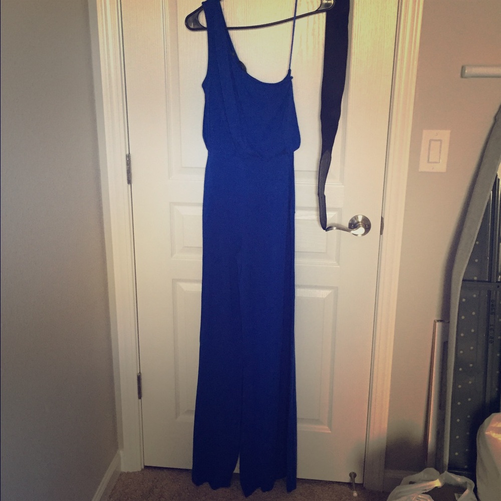 BeBe one shoulder jumpsuit.